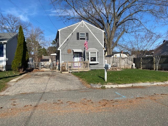 89 Pine Grove Street Springfield, MA 01119 - Photo 2 of 26 a front view of a house with a yard