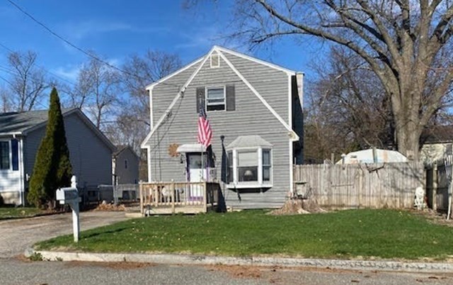 89 Pine Grove Street Springfield, MA 01119 - Photo 23 of 26 a view of a house with a yard