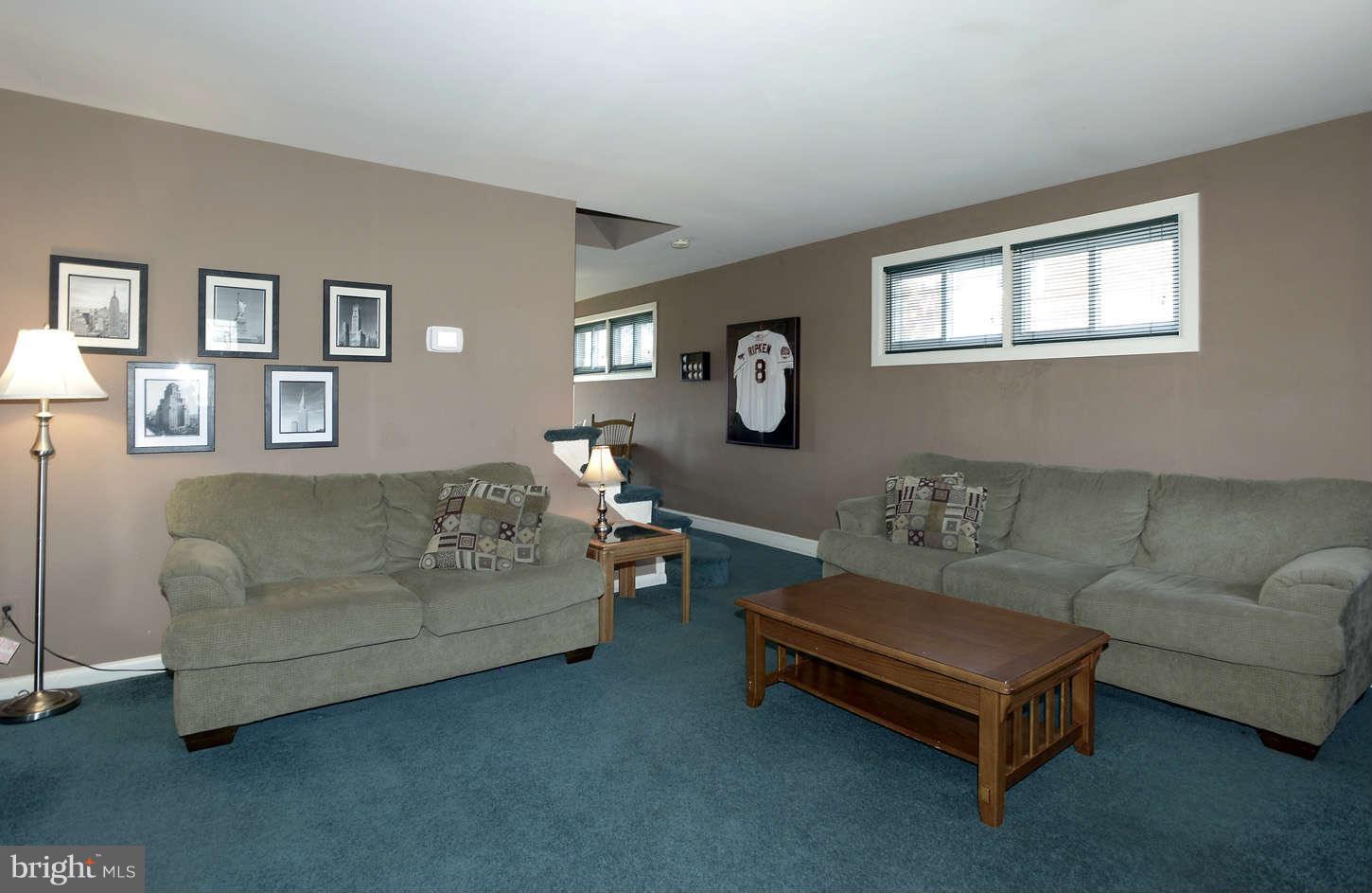 8536 Kings Ridge Road Baltimore, MD 21234 - Photo 3 of 19 a living room with furniture and a window