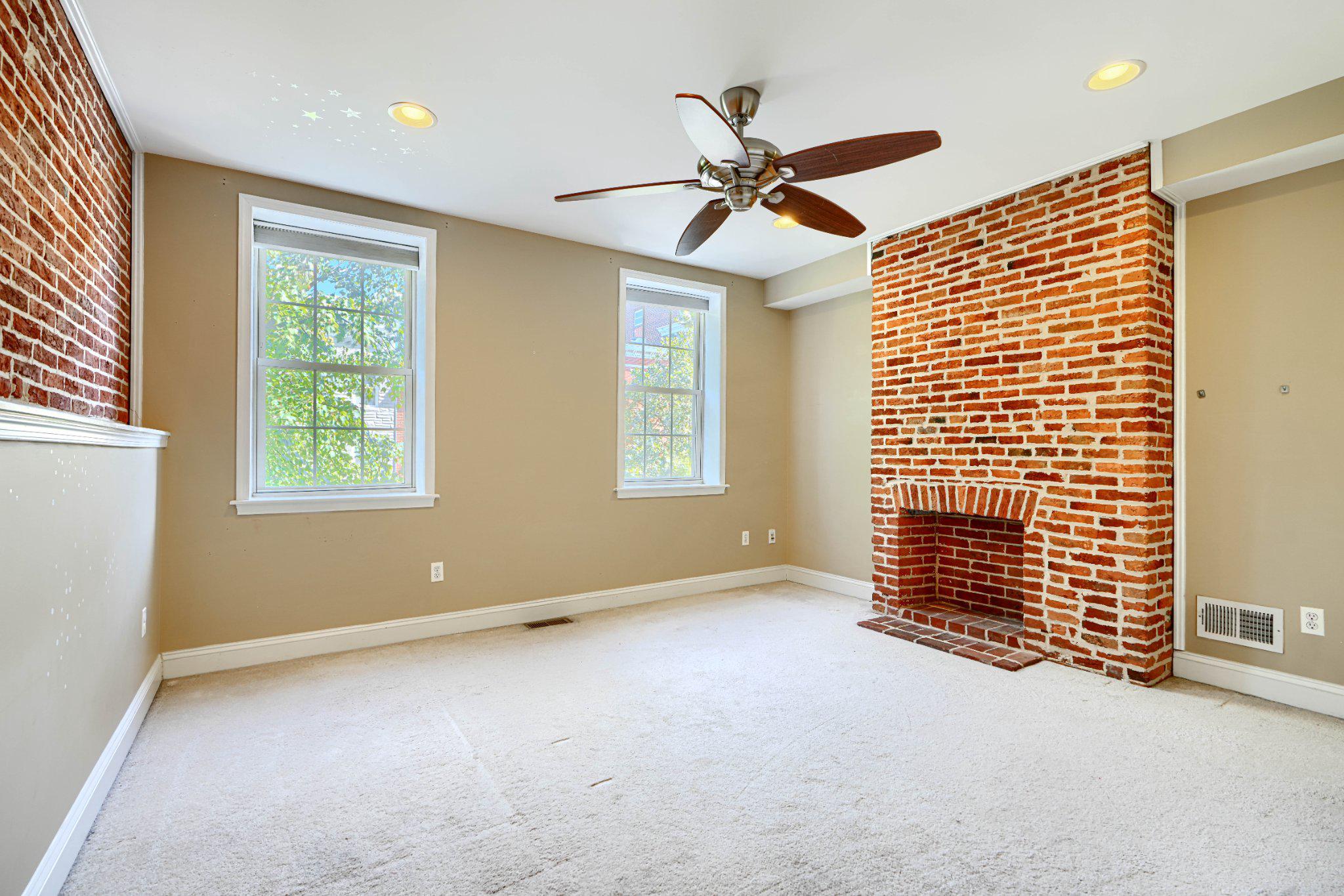 232 South Ann Street Baltimore, MD 21231 - Photo 18 of 62 Primary Suite exposed brick