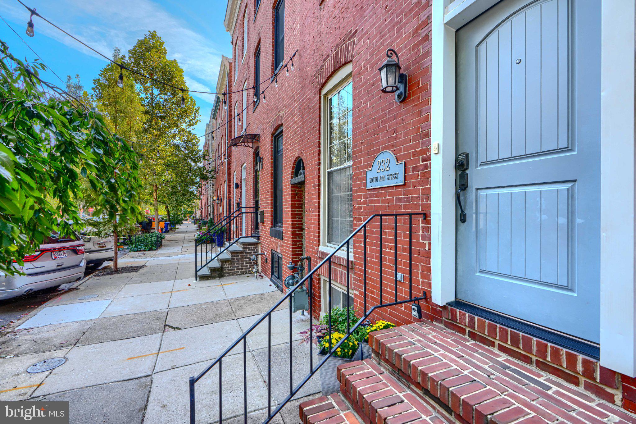 232 South Ann Street Baltimore, MD 21231 - Photo 2 of 62 Charming brick facade with inviting steps.