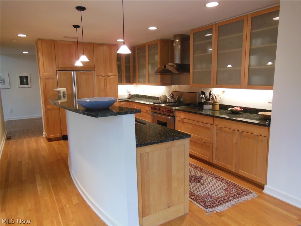 12127 Sperry Road Chesterland, OH 44026 - Photo 10 of 25 Cook's Delight .... Custom Kitchen, Hardwood Flooring, Birch Cabinetry, Accent Lighting, Granite Countertops, Wolf Gas (Propane) Stove!