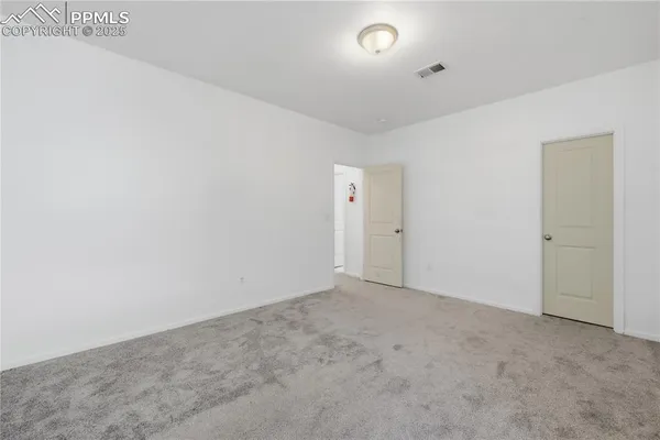 an empty room with an entryway