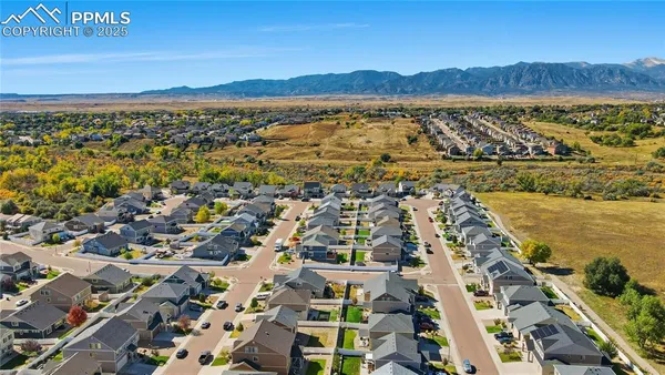 an aerial view of residential building and lake view
