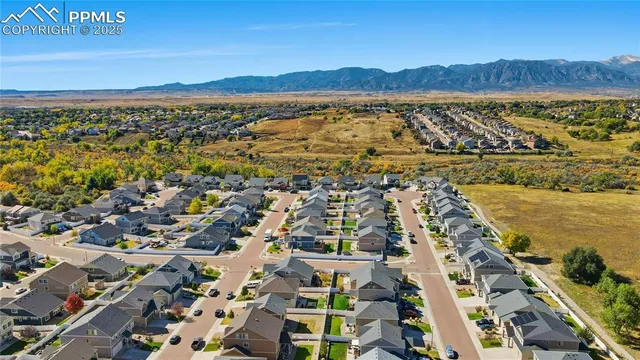 an aerial view of residential building and lake view
