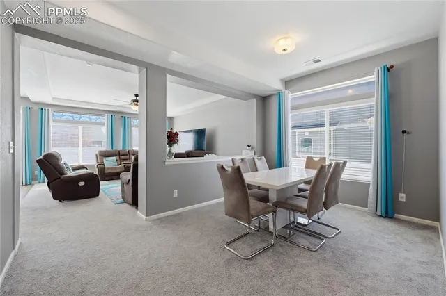 a workspace with furniture and a window