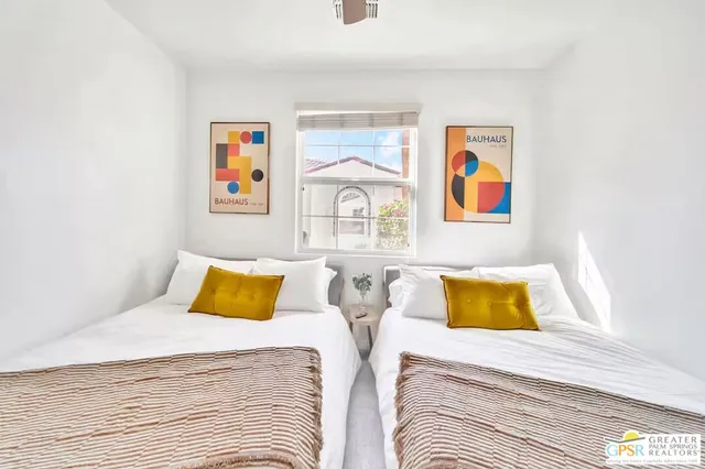 a view of a chairs and table in a patio