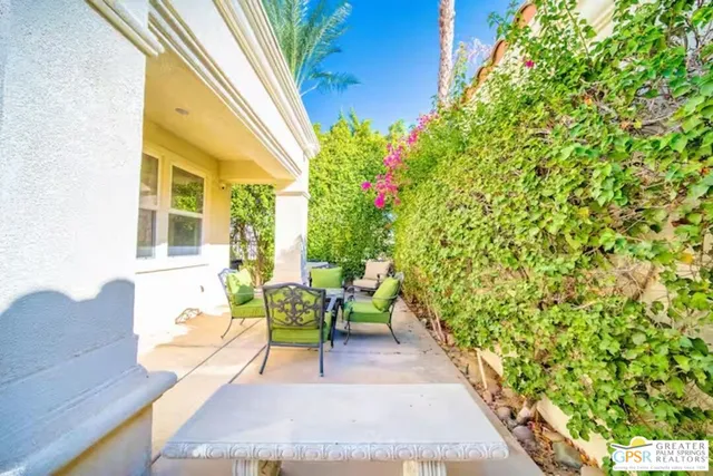 a front view of house with small garden