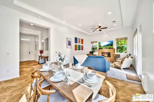 a view of multiple houses with a yard