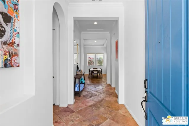 a large kitchen with stainless steel appliances granite countertop a stove a sink dishwasher and cabinets with wooden floor