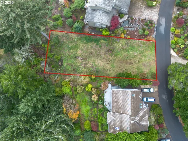 an aerial view of residential house with outdoor space