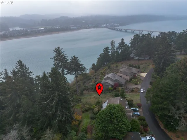 an aerial view of a red and white house