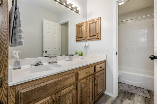 a room with furniture and a window