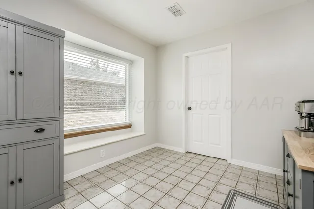 a view of an empty room with window