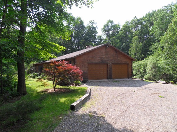 206 County Road Woodstock, CT 06281 - Photo 3 of 24 a house with green field in front of it