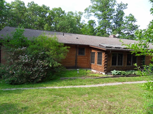 206 County Road Woodstock, CT 06281 - Photo 4 of 24 a view of a house with a garden