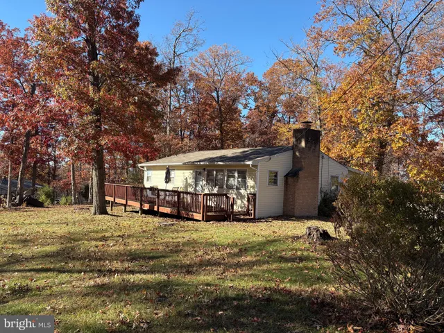 a view of a house with a big yard