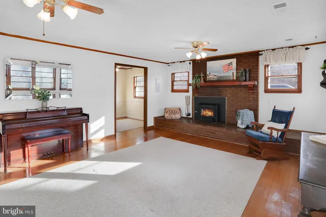 a view of a workspace with furniture