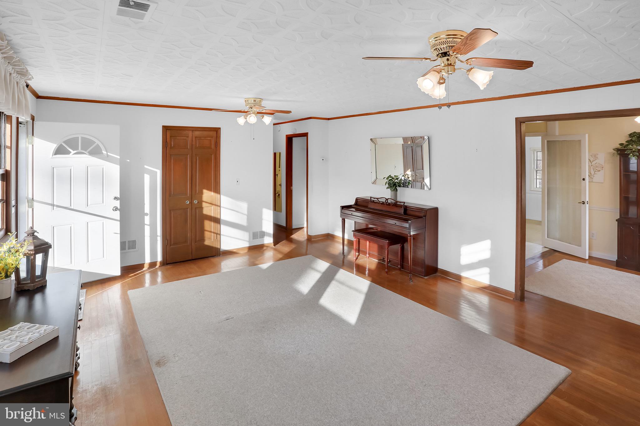 56 Ridgewood Lane Front Royal, VA 22630 - Photo 15 of 49 a living room with furniture and wooden floor