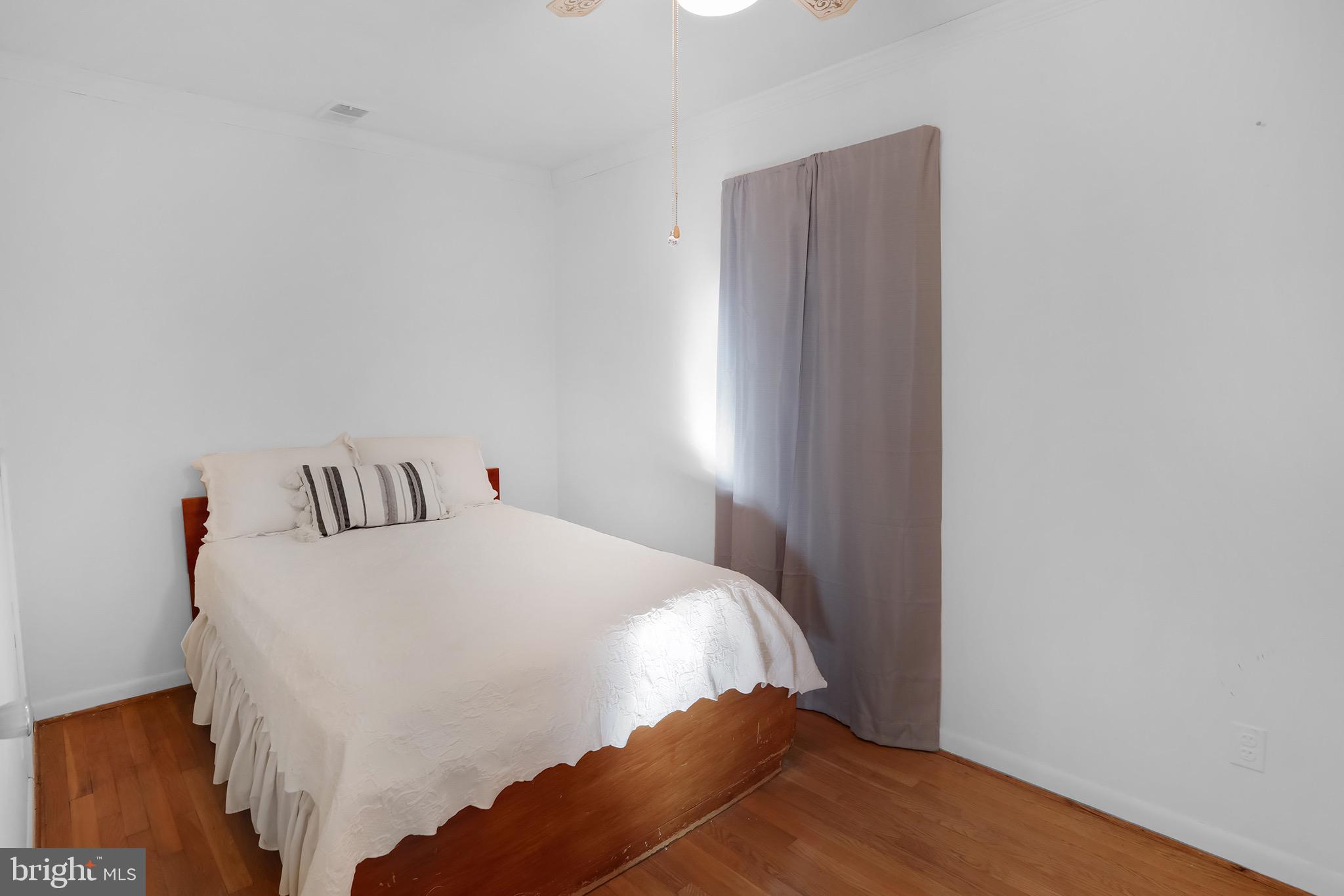 56 Ridgewood Lane Front Royal, VA 22630 - Photo 18 of 49 a bedroom with a bed and a table