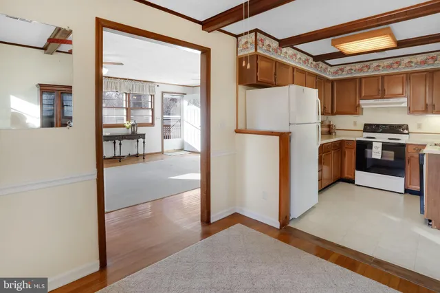 a bathroom with a sink a vanity and a toilet