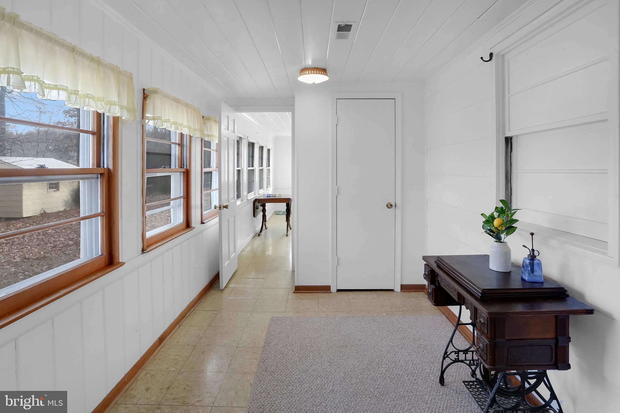 56 Ridgewood Lane Front Royal, VA 22630 - Photo 28 of 49 a living room with furniture and a potted plant