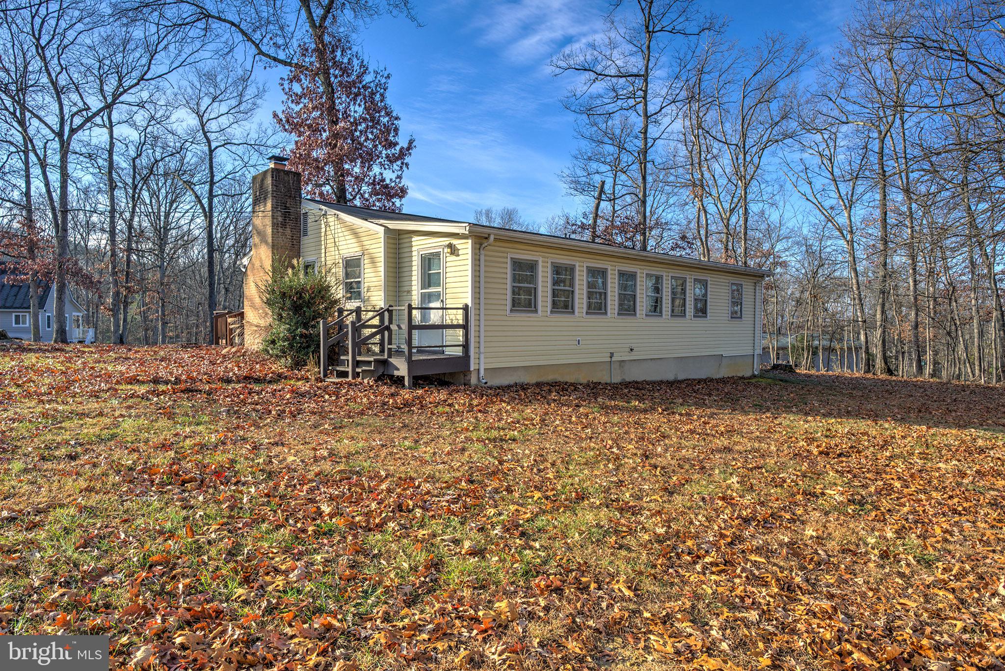 56 Ridgewood Lane Front Royal, VA 22630 - Photo 7 of 49 front view of a house with a yard