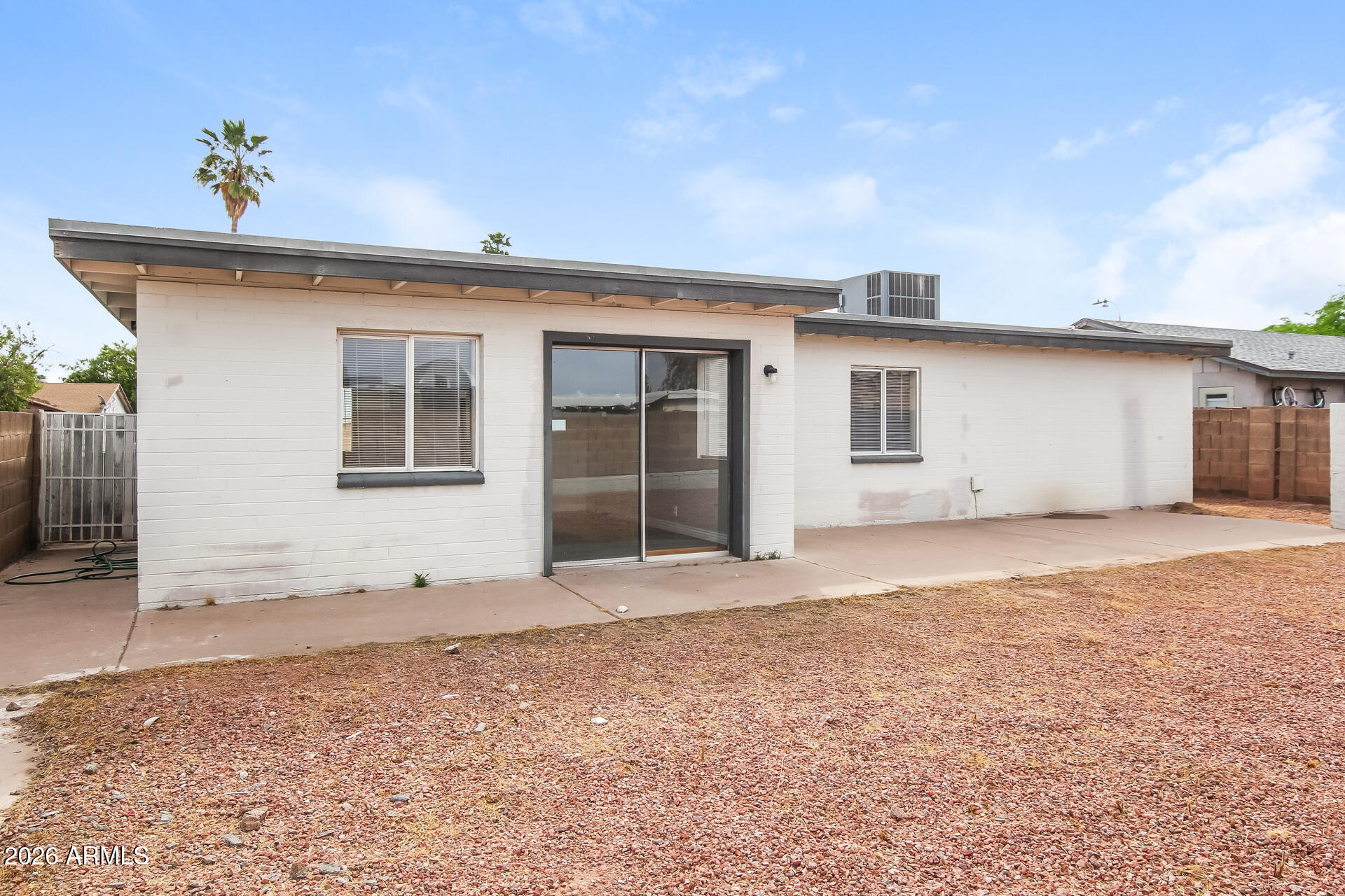 6402 South 44th Street Phoenix, AZ 85042 - Photo 2 of 20 a view of an empty room with a window