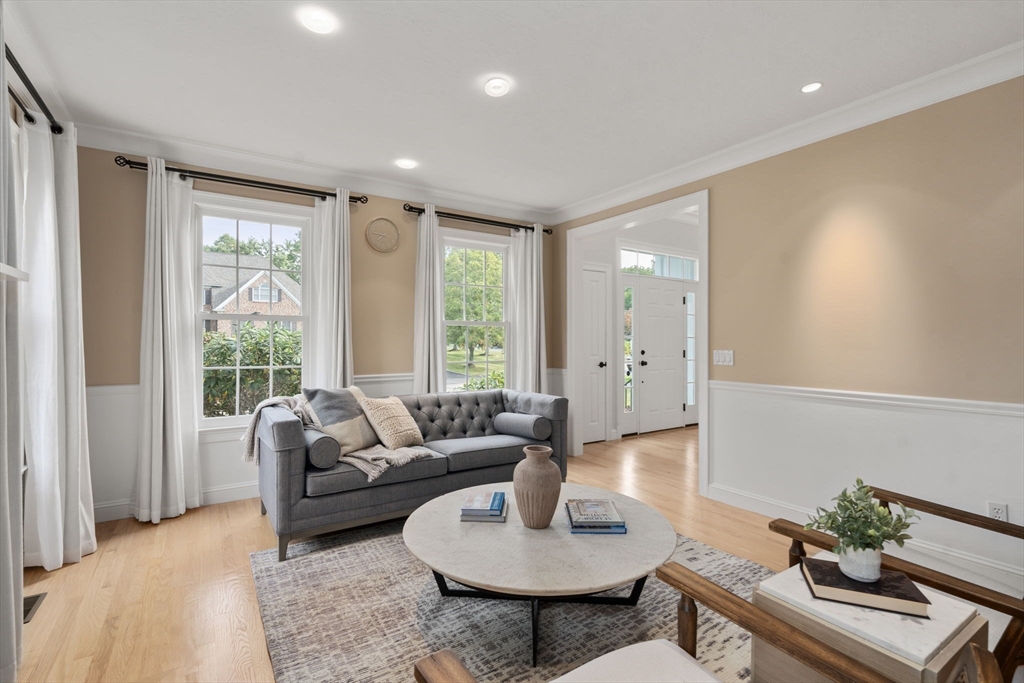21 Cedar Springs Lane Needham, MA 02492 - Photo 13 of 31 a living room with furniture and a large window