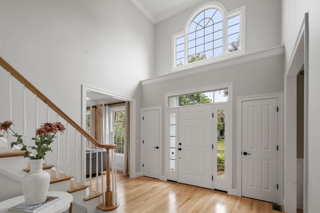 21 Cedar Springs Lane Needham, MA 02492 - Photo 18 of 31 a view of entryway with wooden floor