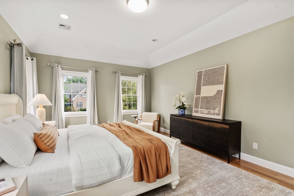 21 Cedar Springs Lane Needham, MA 02492 - Photo 20 of 31 a bedroom with a bed and window