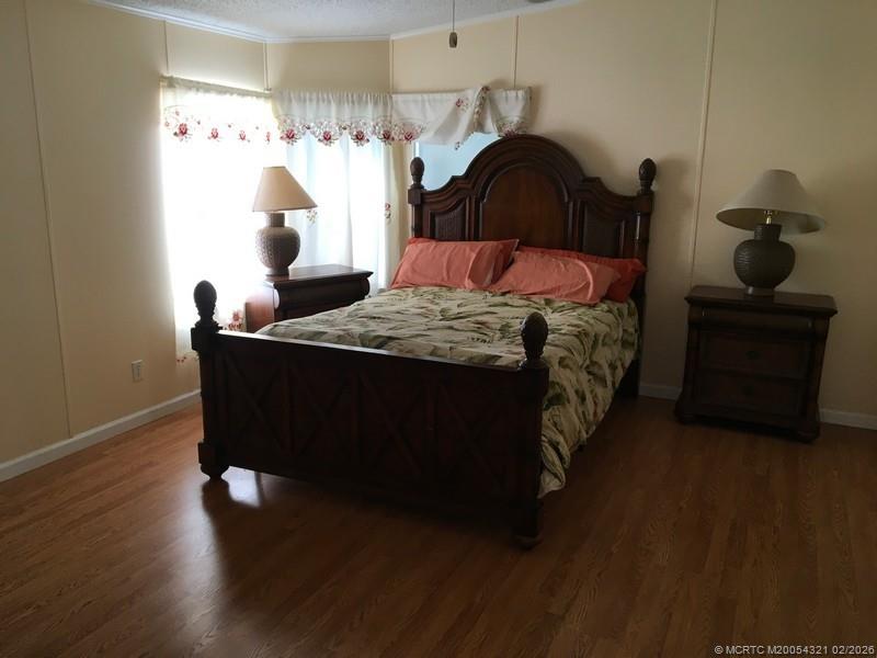 16448 Southwest Two Wood Way Indiantown, FL 34956 - Photo 10 of 15 Master Suite