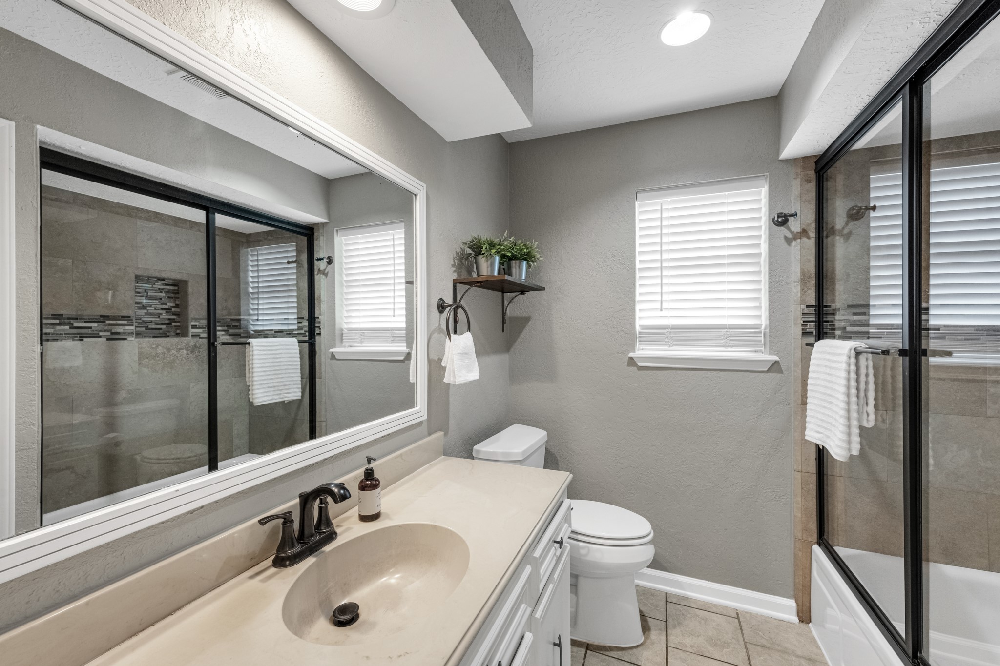 622 South Rivershire Drive Conroe, TX 77304 - Photo 22 of 25 Secondary bathroom features updated shower