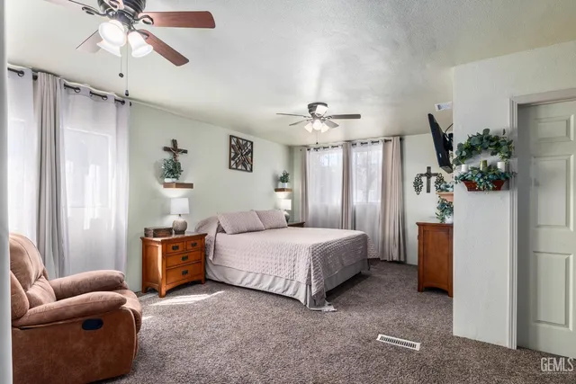 a view of a house with outdoor space and sitting area