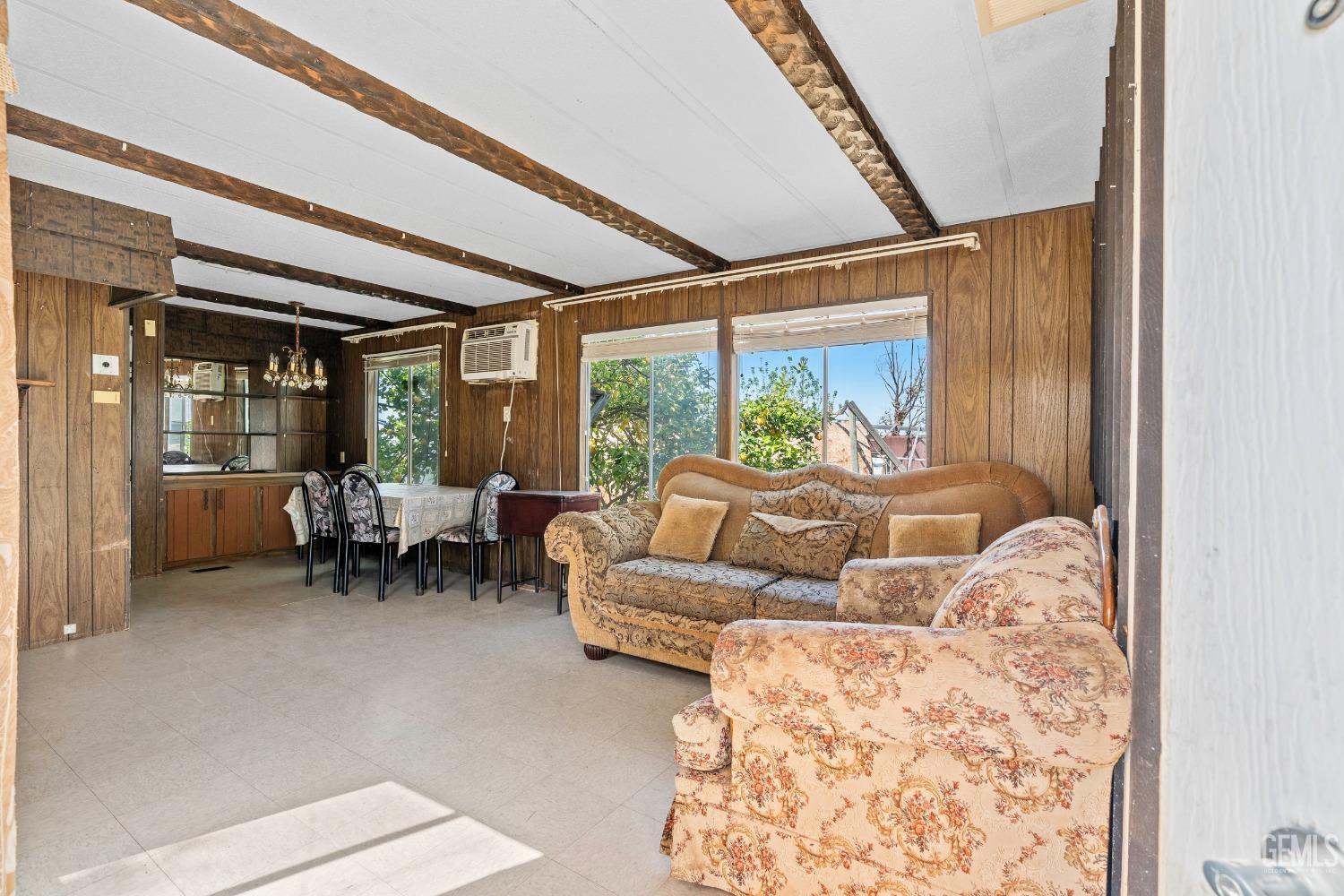 Undisclosed Address Delano, CA 93215 - Photo 33 of 72 a living room with furniture and a large window