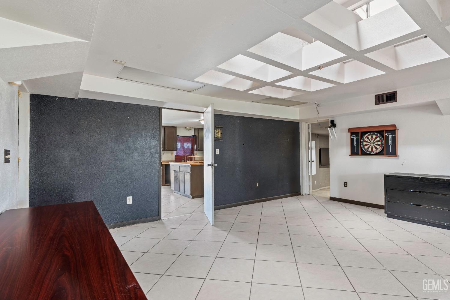 Undisclosed Address Delano, CA 93215 - Photo 44 of 72 a view of a livingroom with an empty space and a ceiling fan