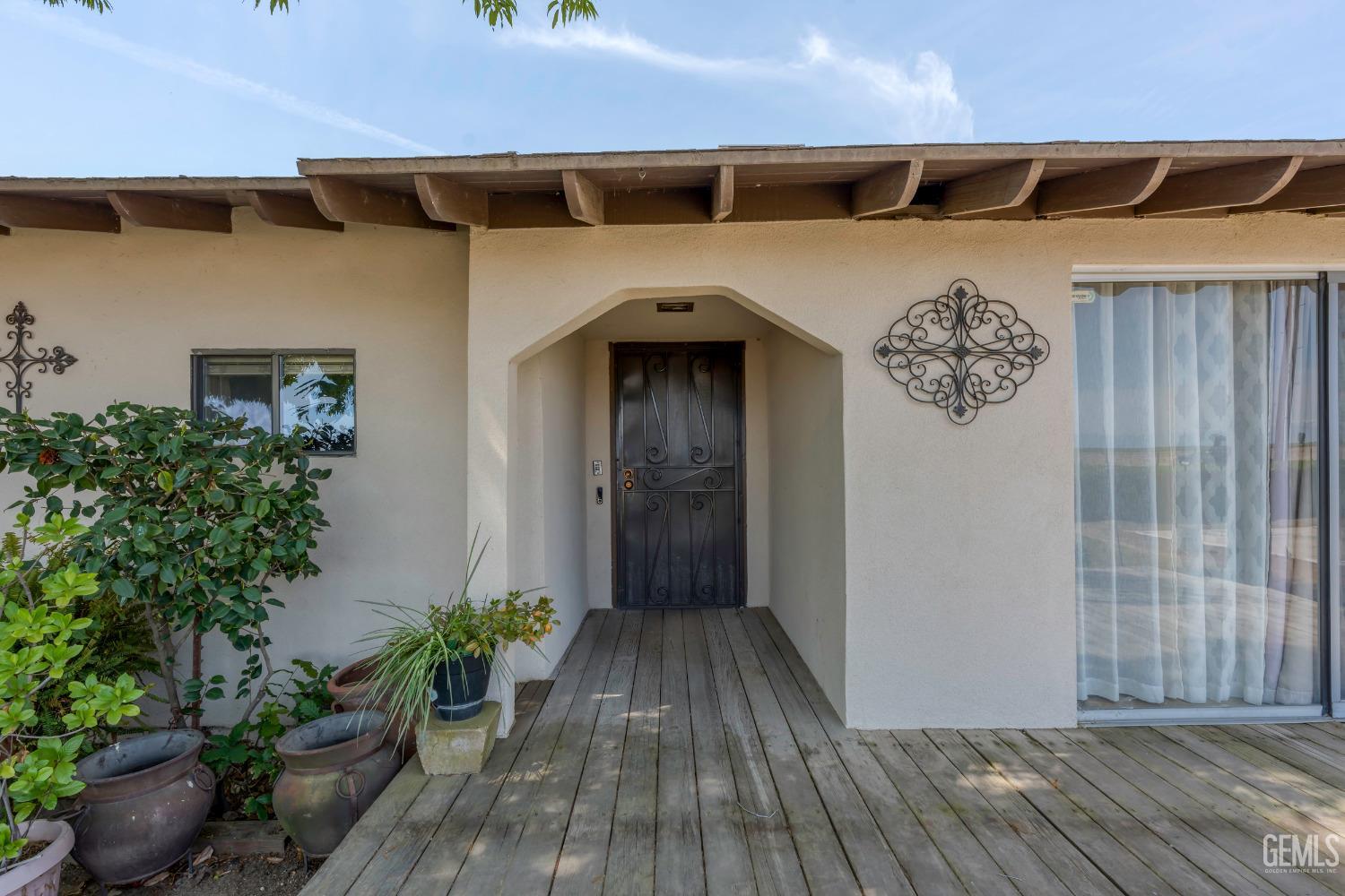 Undisclosed Address Delano, CA 93215 - Photo 10 of 72 a view of entryway with wooden floor