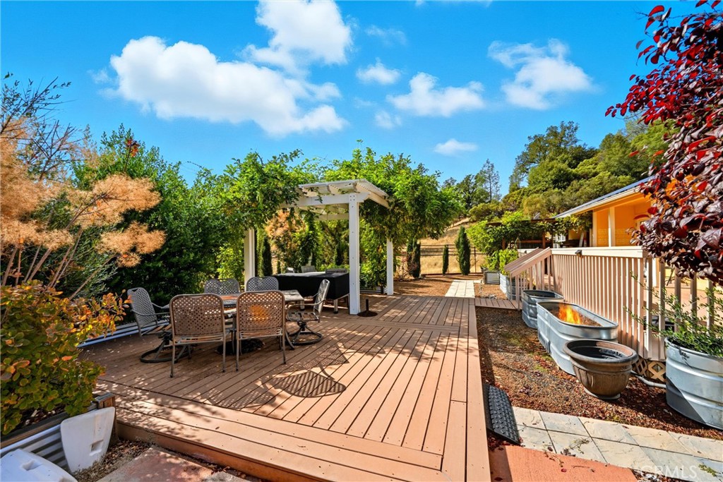 6850 High Valley Road Kelseyville, CA 95451 - Photo 3 of 45 Finished patio, covered grape arbor. Perfect for outdoor enjoyment and entertaining..