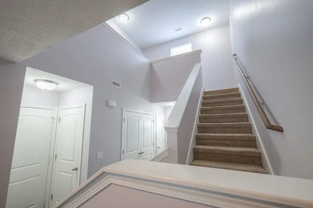 a view of hallway with washer and dryer