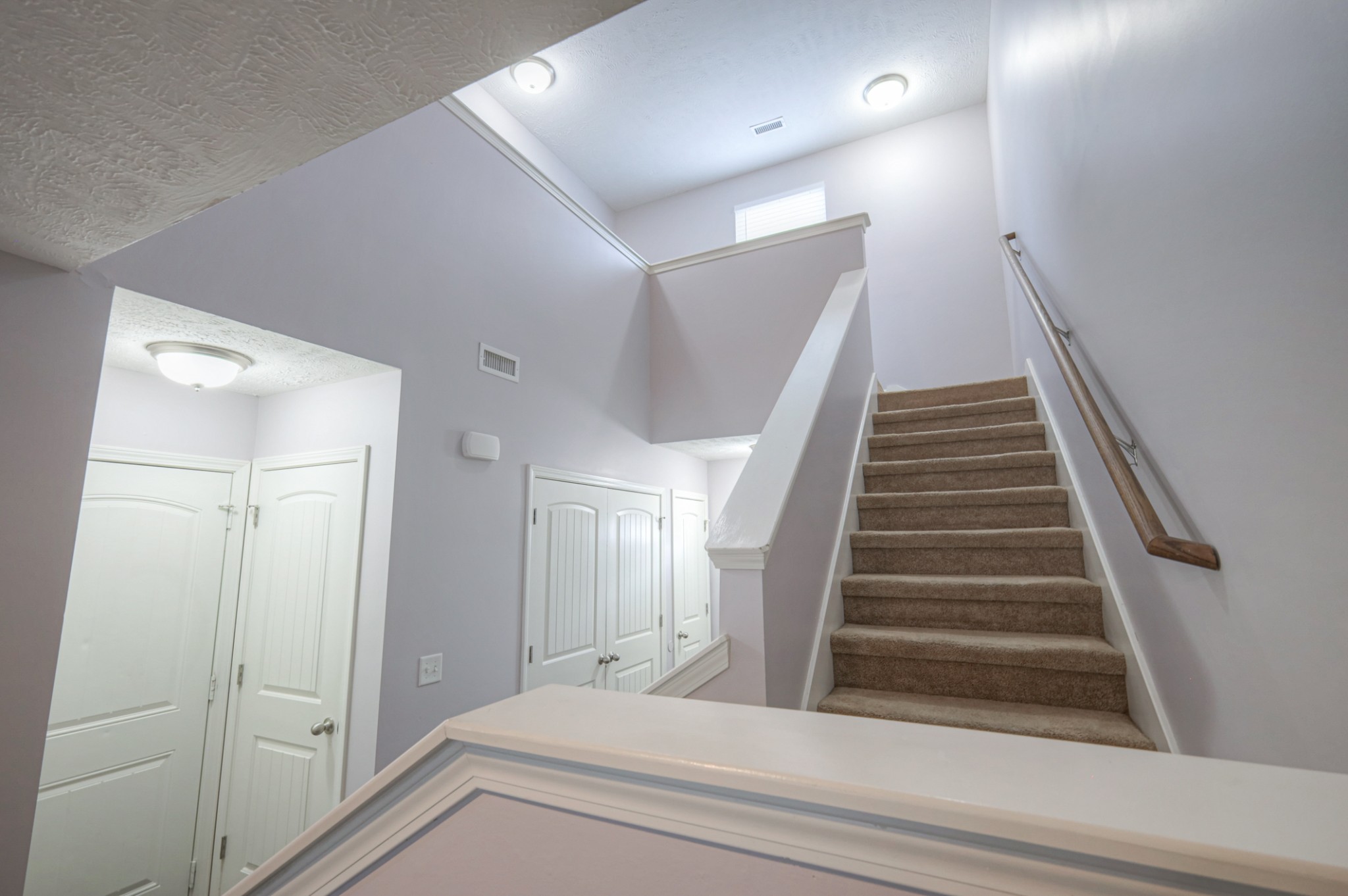 4245 Sunday Silence Way Murfreesboro, TN 37128 - Photo 20 of 39 a view of a hallway with wooden floor and entryway