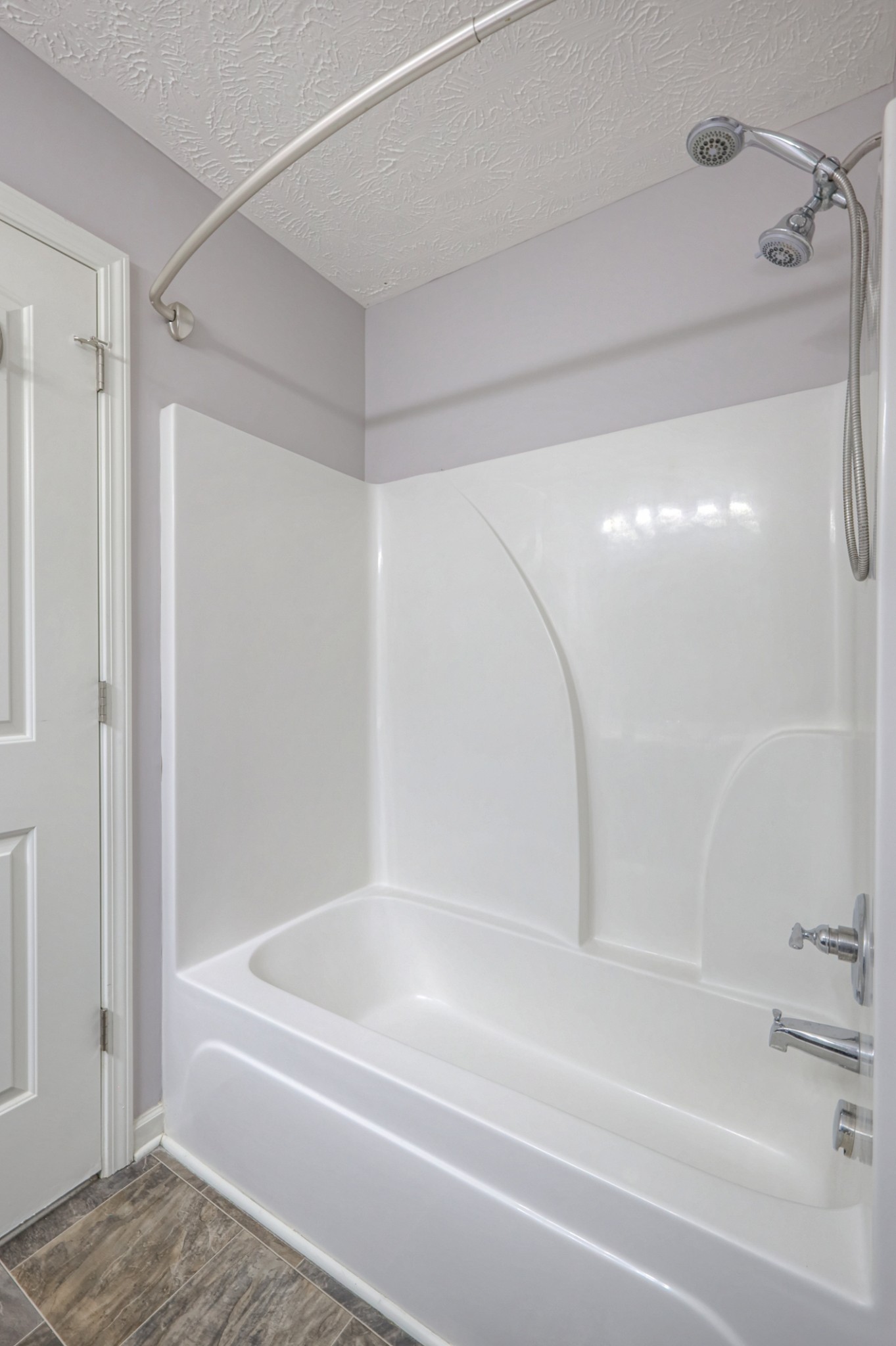 4245 Sunday Silence Way Murfreesboro, TN 37128 - Photo 30 of 39 a bathroom with a shower and a bath tub