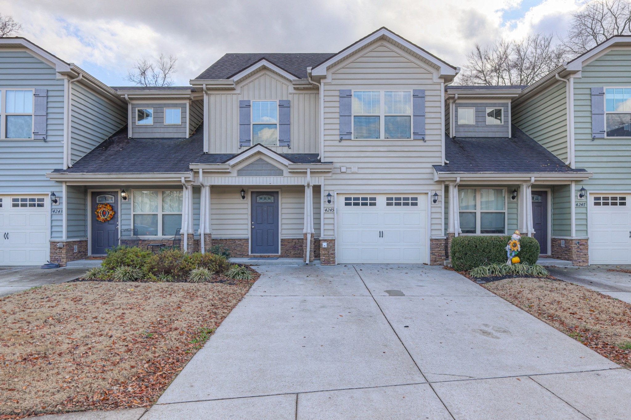 4245 Sunday Silence Way Murfreesboro, TN 37128 - Photo 3 of 39 a front view of a house with garden