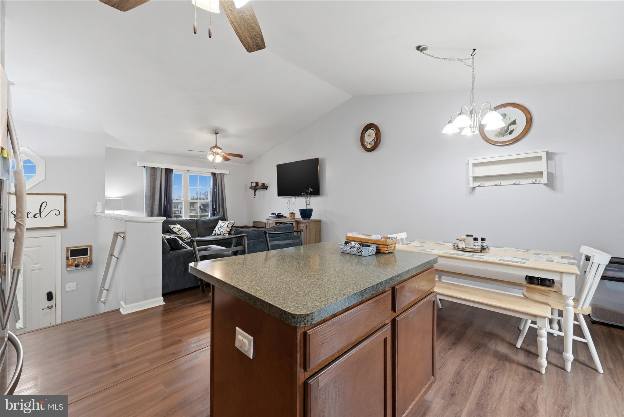 212 Freight Car Circle Inwood, WV 25428 - Photo 12 of 41 a kitchen with a sink cabinets and wooden floor
