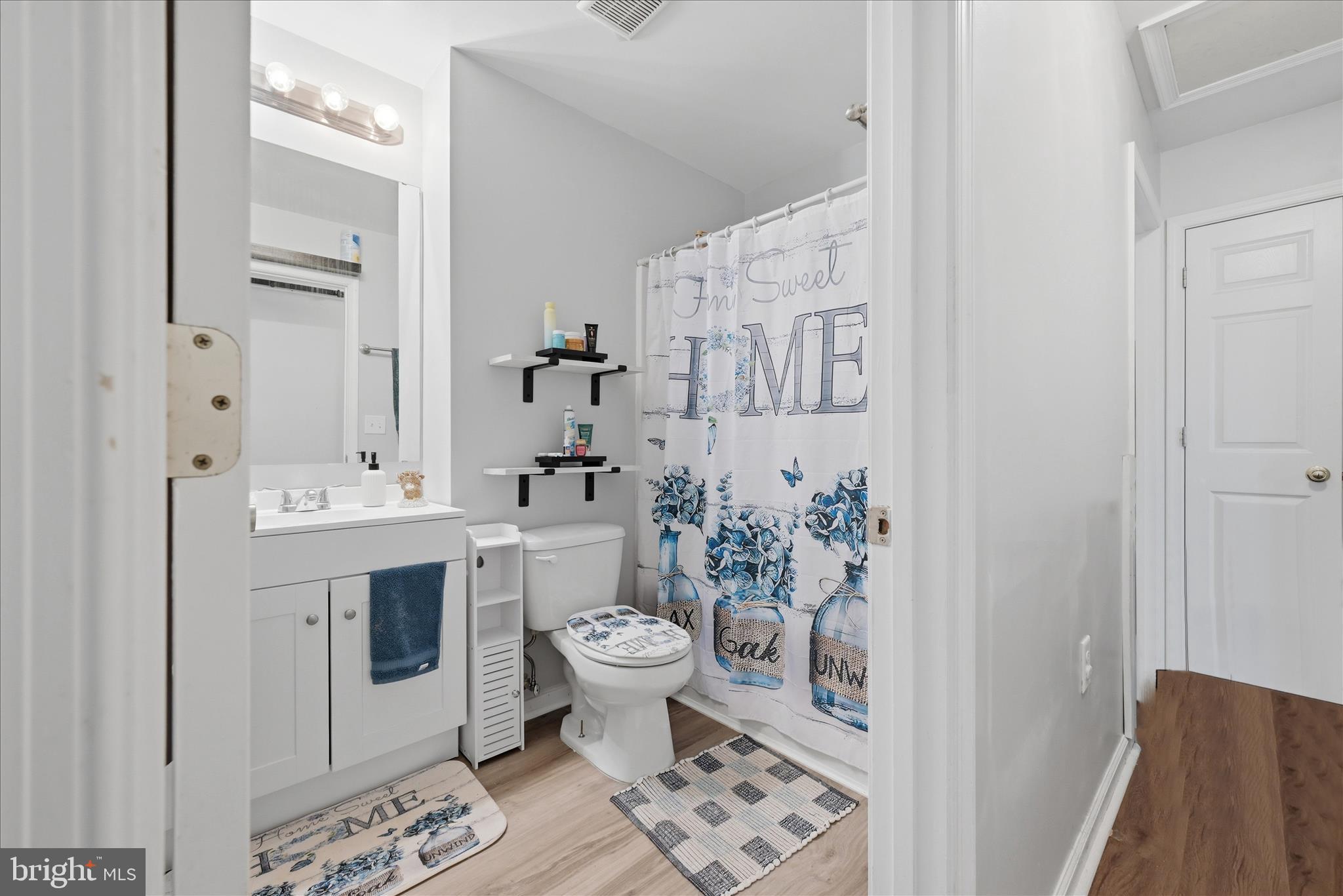 212 Freight Car Circle Inwood, WV 25428 - Photo 15 of 41 a bathroom with a sink toilet and shower