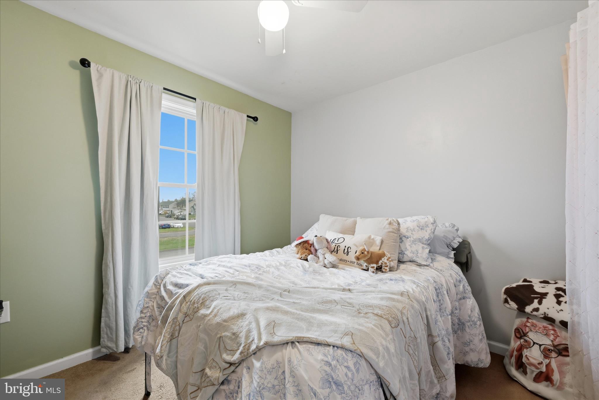 212 Freight Car Circle Inwood, WV 25428 - Photo 22 of 41 a bedroom with a bed and a window