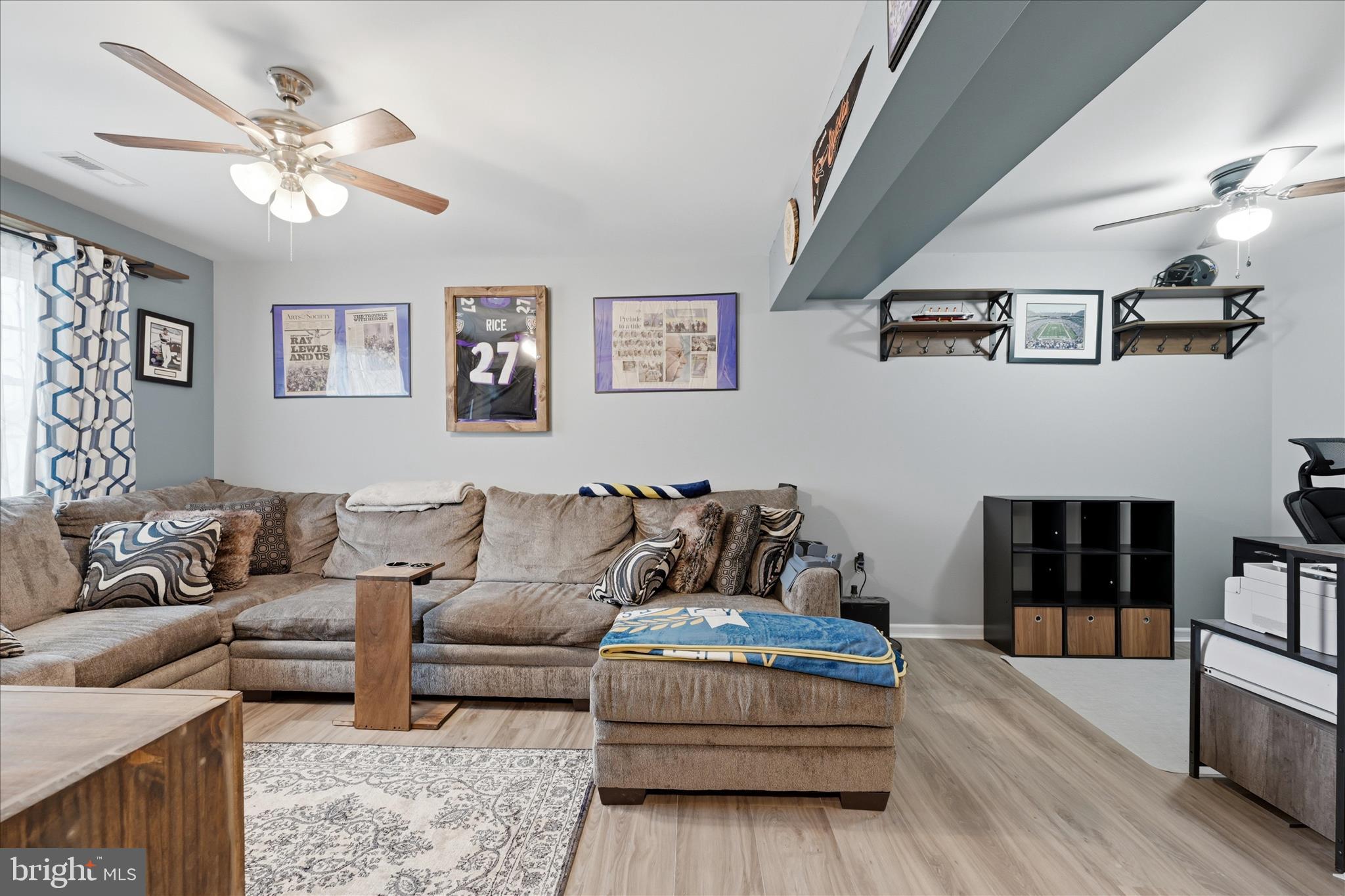 212 Freight Car Circle Inwood, WV 25428 - Photo 25 of 41 a living room with furniture and a fireplace