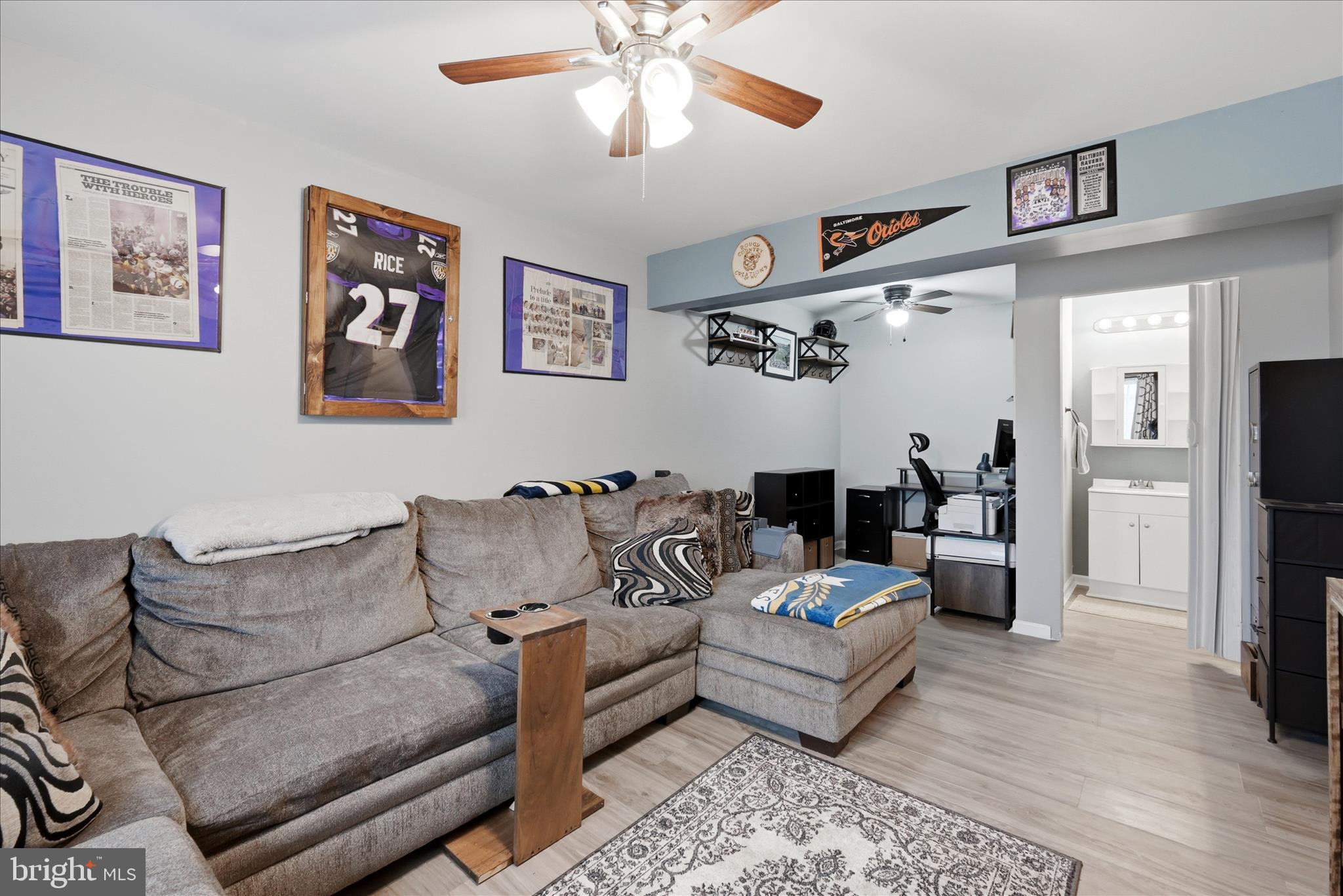 212 Freight Car Circle Inwood, WV 25428 - Photo 27 of 41 a living room with furniture and a flat screen tv