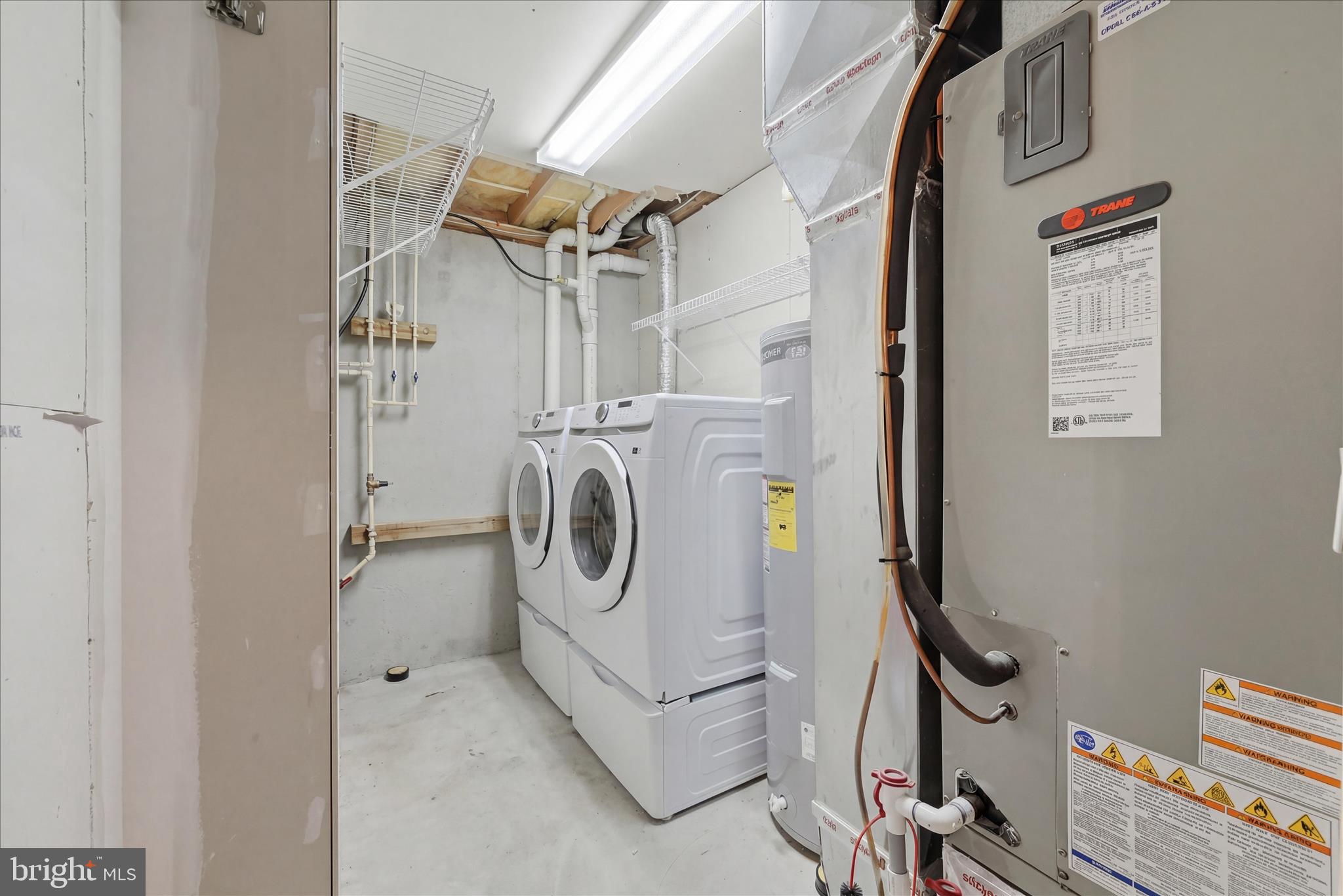 212 Freight Car Circle Inwood, WV 25428 - Photo 30 of 41 a view of storage and utility room with washer and dryer