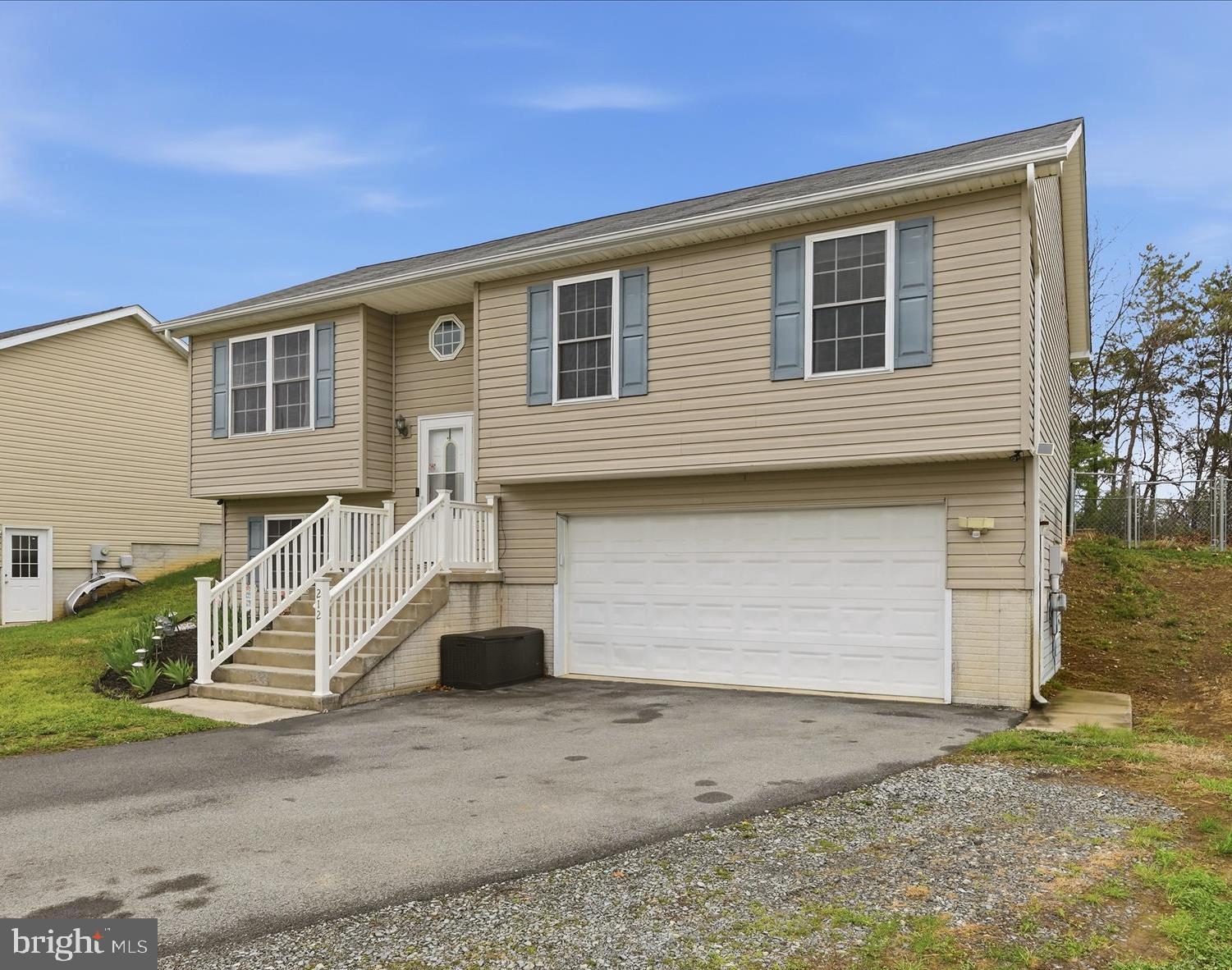 212 Freight Car Circle Inwood, WV 25428 - Photo 33 of 41 a front view of a house with a yard