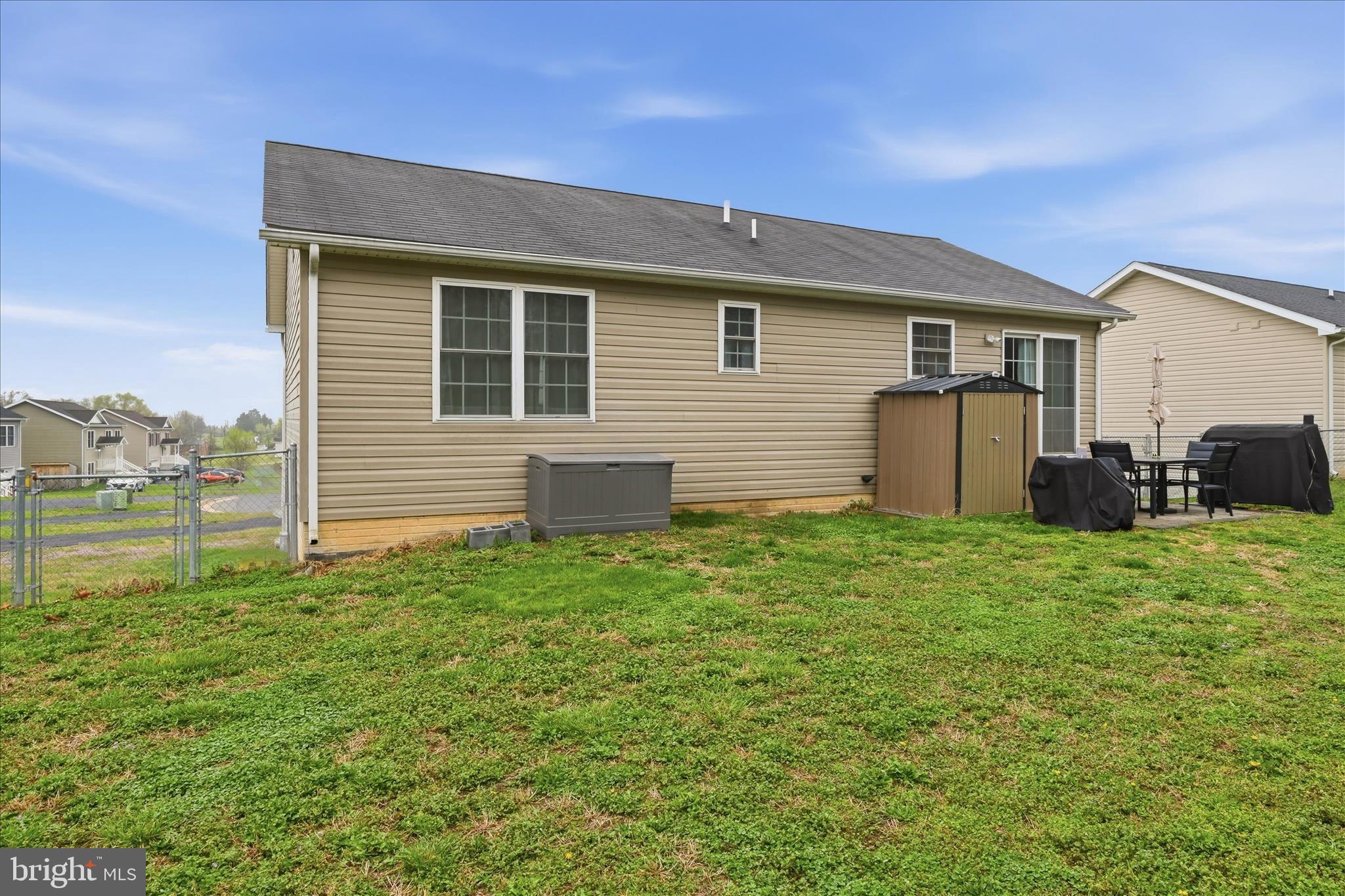 212 Freight Car Circle Inwood, WV 25428 - Photo 36 of 41 a house view with a backyard space